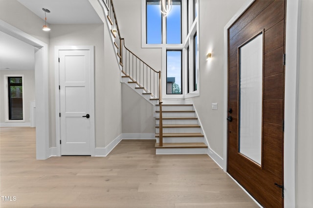 2305 Turners Aly, Raleigh, NC 27607 - entrance foyer with light wood finished floors and stairway