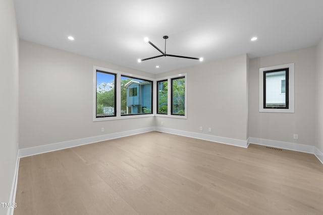 2305 Turners Aly, Raleigh, NC 27607 - spare room featuring light wood-type flooring and recessed lighting