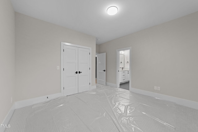 2305 Turners Aly, Raleigh, NC 27607 - unfurnished bedroom with a closet and connected bathroom