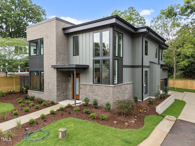 2305 Turners Aly, Raleigh, NC 27607 - modern home featuring brick siding