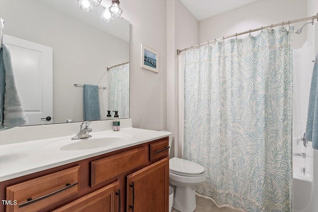 full bathroom with vanity and toilet