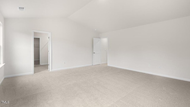 139 Ethel Ln, Angier, NC 27501 - unfurnished room with light carpet, vaulted ceiling, and baseboards