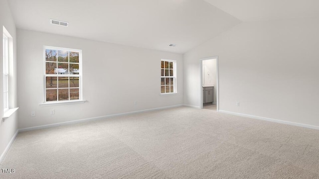 139 Ethel Ln, Angier, NC 27501 - unfurnished room featuring lofted ceiling, light carpet, and baseboards