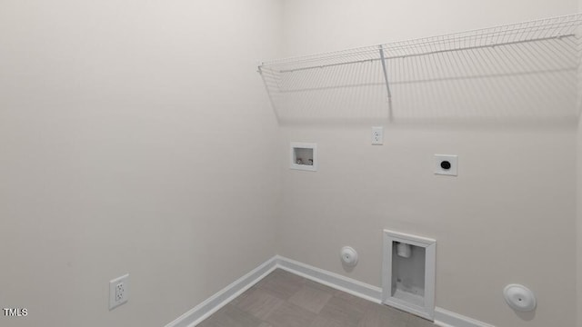 139 Ethel Ln, Angier, NC 27501 - washroom with gas dryer hookup, washer hookup, hookup for an electric dryer, baseboards, and tile patterned floors