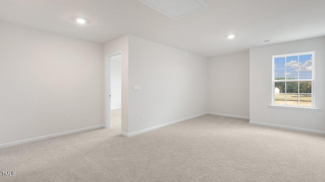 139 Ethel Ln, Angier, NC 27501 - unfurnished room featuring light carpet, attic access, recessed lighting, and baseboards