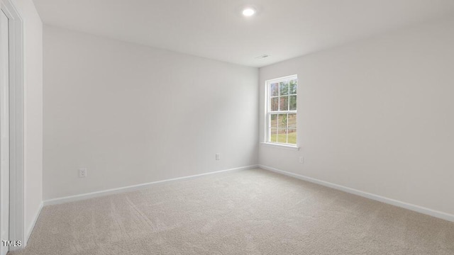139 Ethel Ln, Angier, NC 27501 - unfurnished room with light colored carpet, baseboards, and recessed lighting