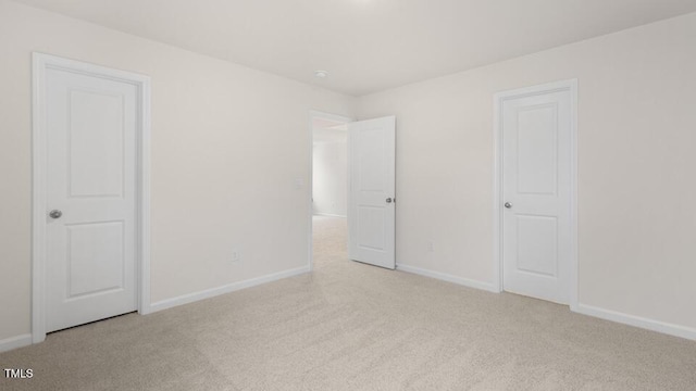 139 Ethel Ln, Angier, NC 27501 - unfurnished bedroom with carpet floors and baseboards