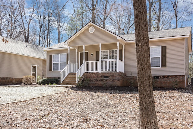 view of front facade with crawl space and covered porch