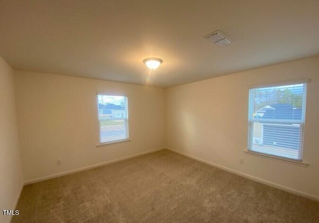 view of carpeted spare room