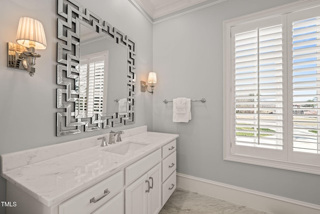 bathroom featuring vanity, baseboards, marble finish floor, and ornamental molding