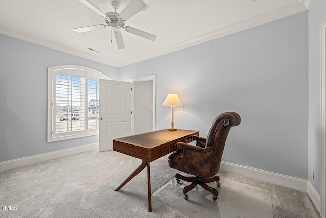 carpeted home office featuring visible vents, baseboards, ceiling fan, and crown molding