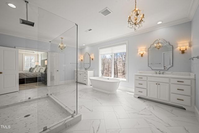 full bathroom featuring a sink, visible vents, a chandelier, and crown molding