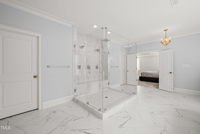 ensuite bathroom featuring a marble finish shower, crown molding, baseboards, an inviting chandelier, and marble finish floor