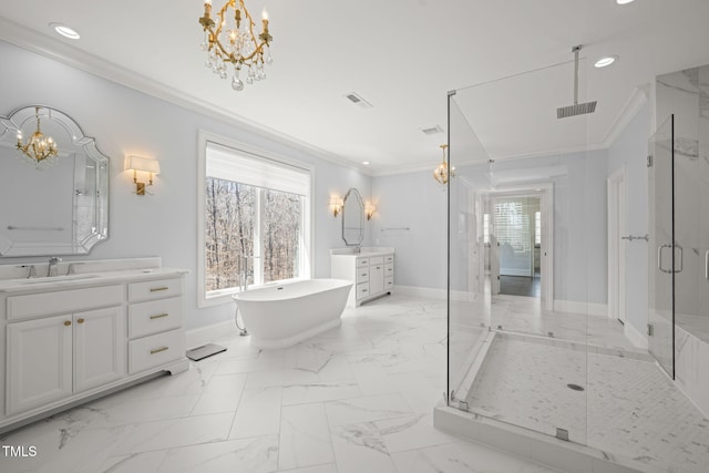 full bath with a sink, crown molding, a stall shower, and a chandelier