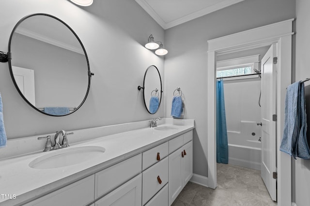 bathroom with crown molding, double vanity, shower / bath combo with shower curtain, and a sink