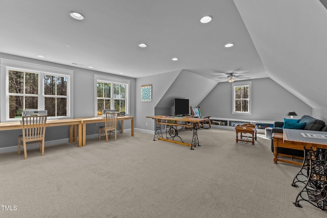 carpeted home office featuring lofted ceiling, recessed lighting, and baseboards