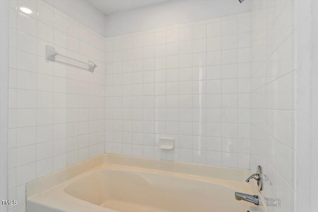 bathroom with shower / bathtub combination