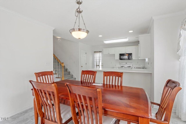 dining room with crown molding, stairway, recessed lighting, and baseboards