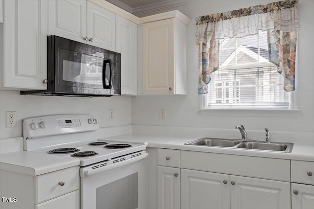 kitchen featuring black microwave, light countertops, electric range, white cabinets, and a sink