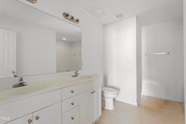 full bathroom featuring a sink, visible vents, toilet, and double vanity