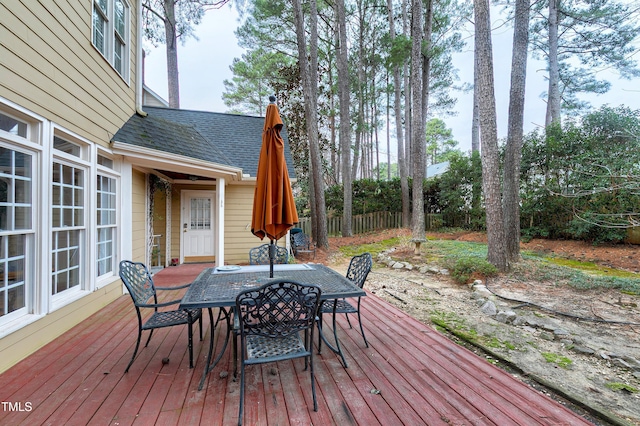 wooden deck with outdoor dining area