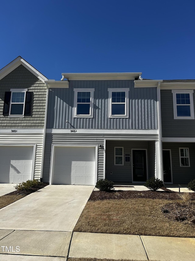 multi unit property featuring a garage