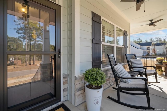 exterior space featuring ceiling fan