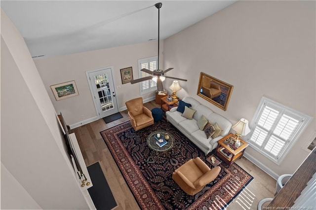 living room with hardwood / wood-style flooring and a healthy amount of sunlight