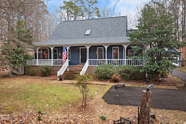 view of front of home with a front lawn and a porch