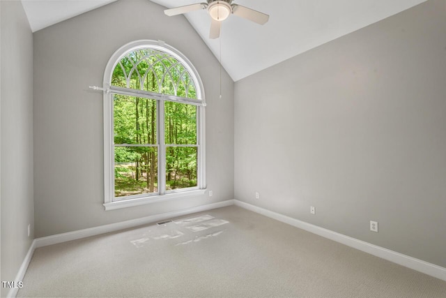 unfurnished room with carpet floors, a ceiling fan, and a healthy amount of sunlight