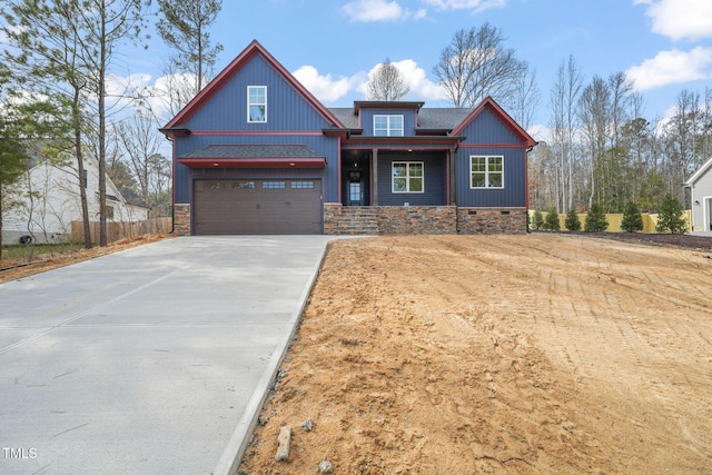 view of front facade featuring crawl space, a garage, and concrete driveway