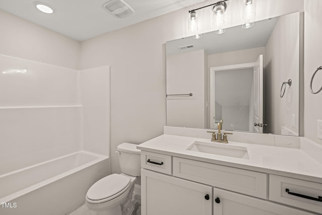 bathroom with visible vents, vanity, toilet, and bathing tub / shower combination
