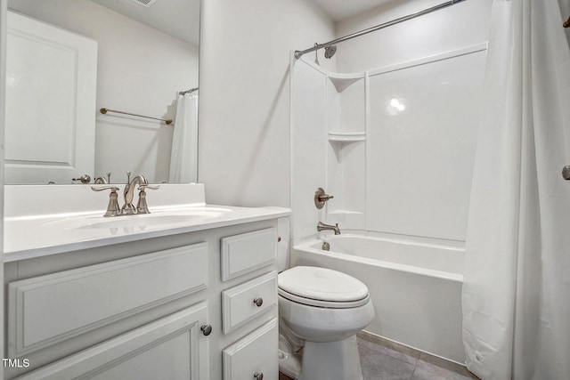 bathroom featuring toilet, shower / bath combo, tile patterned flooring, and vanity