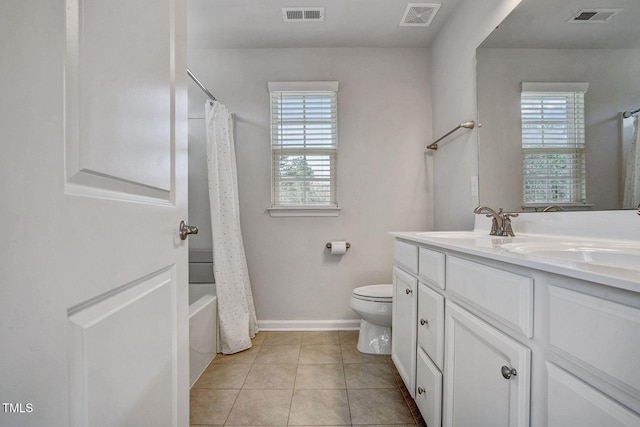 full bath featuring tile patterned flooring, visible vents, and shower / bath combo with shower curtain