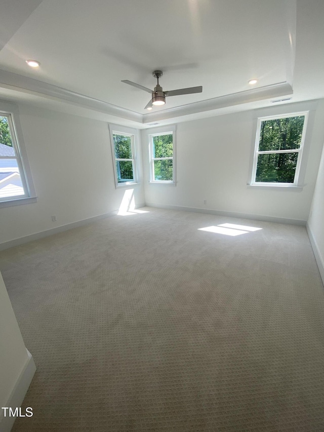 empty room with baseboards and carpet flooring
