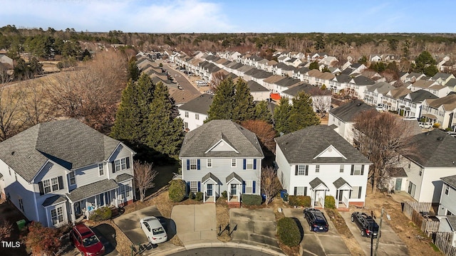 birds eye view of property with a residential view