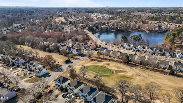 birds eye view of property with a water view and a residential view