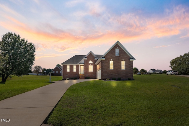 view of front of home with a lawn