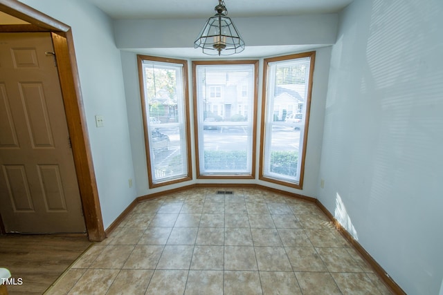 interior space with light tile patterned flooring