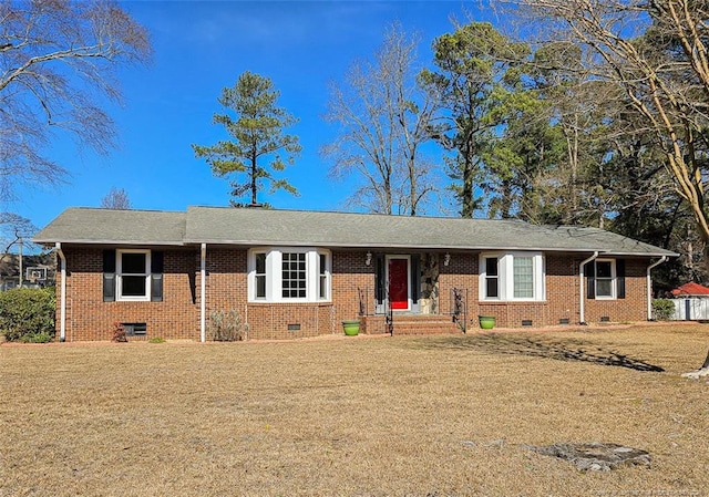 ranch-style home featuring a front yard