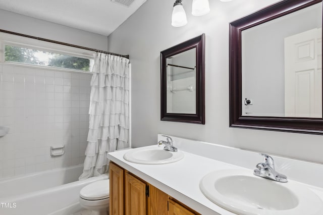 2006 Chedington Dr, Apex, NC 27502 - bathroom featuring shower / bath combo and double vanity