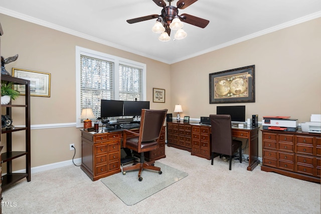 office featuring light carpet, baseboards, and crown molding