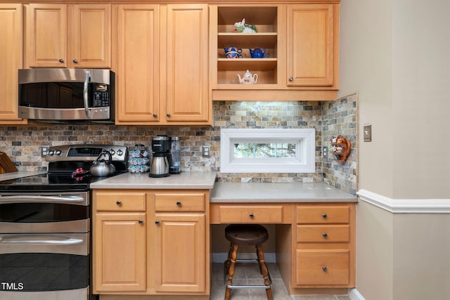 kitchen with stainless steel appliances, light countertops, open shelves, and tasteful backsplash