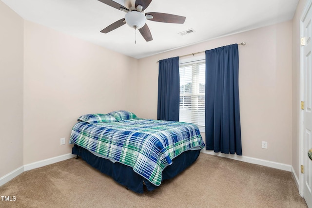 bedroom featuring carpet flooring, visible vents, and baseboards