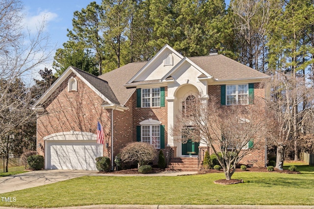 traditional home with a garage, brick siding, and a front lawn