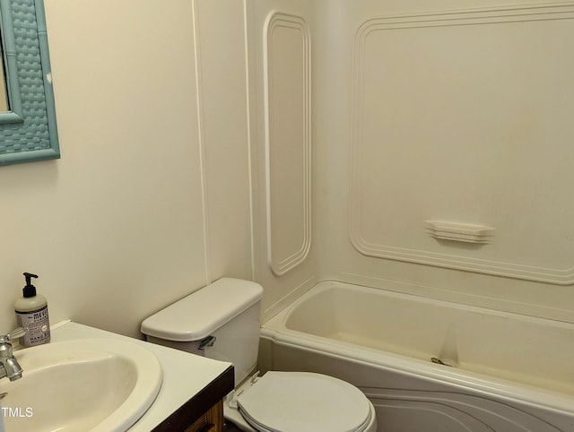 full bathroom featuring toilet, vanity, and shower / bathtub combination