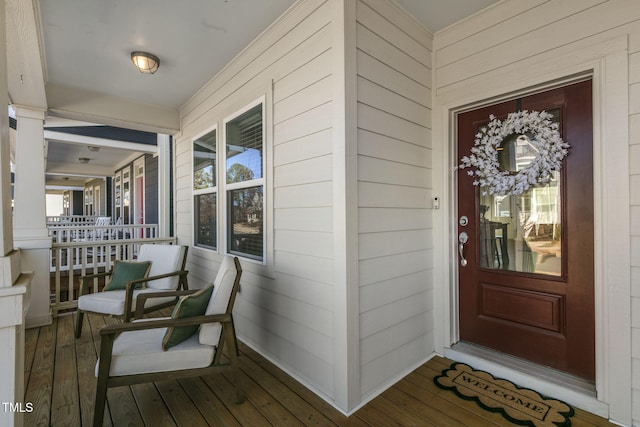 entrance to property with covered porch