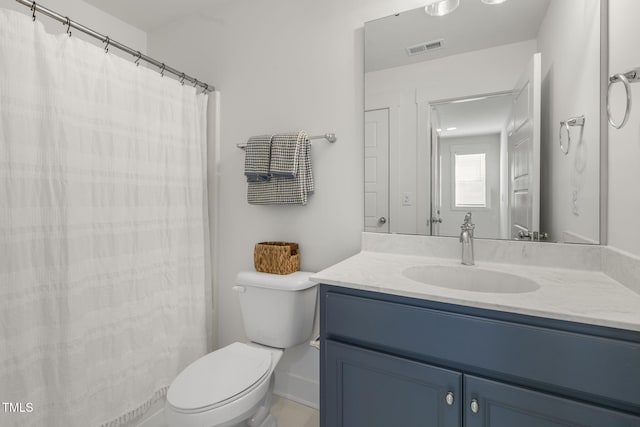 full bathroom with visible vents, vanity, and toilet