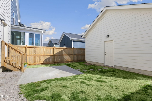 view of yard with a patio area and fence