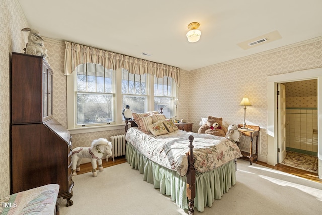 carpeted bedroom with radiator